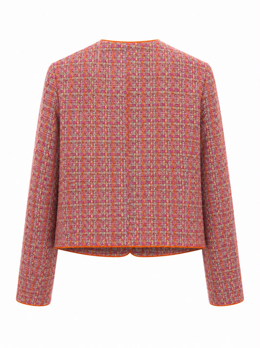 Casaco Ginger Aurora Tweed, com textura xadrez e corte elegante, exibido em close na imagem.