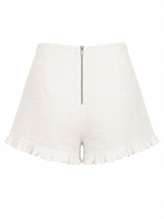 Short tweed de verão da WLC, tecido leve e estiloso, exibido na imagem, ideal para looks elegantes na estação quente.
