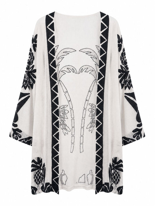 Casaco Kimono Artesanal Tropicália da WLC, com estampa colorida e detalhes artesanais, exibido na imagem.