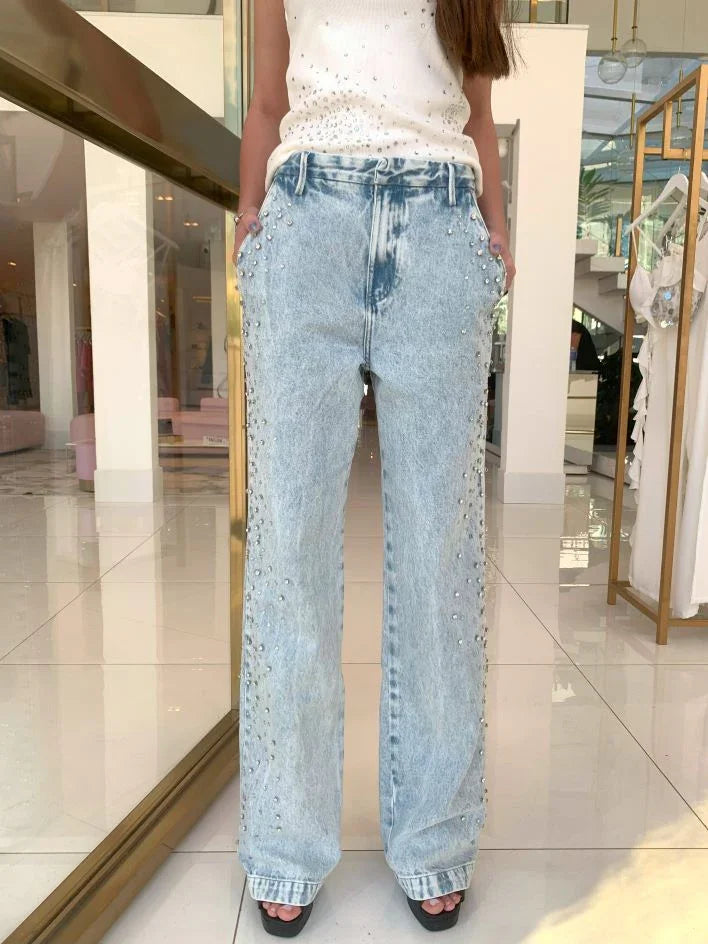 Calça jeans boot WLC, estilo skinny, em tecido denim azul, vista frontal com detalhes de costura.
